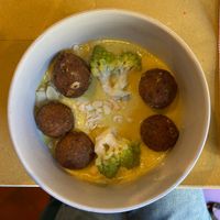 Seitan meatballs with coconut and curry sauce   at Lo Fai in Piacenza
