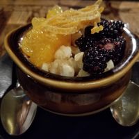 Panna Cotta with Macadamia Nuts, Fresh Blackberries, Orange Slices, & Candied Orange Peel. Delish & Vegan. at Mesa Verde in Santa Barbara