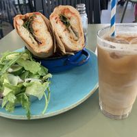 Burghul falafel and shakshuka sandwich with cold coffee  at The Streets - Ibn Gabirol in Tel Aviv