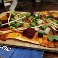 tarte flambée with vegetables (vegan) at BRASSERIE Saarbrücken in Saarland