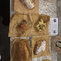 Iced Bun, Honeycomb Croissant, Cheese And Jalapeño Focaccia, Cookie Dough Croissant, Fresh Sourdough.   at BEK Sourdough Bakery in Gosport