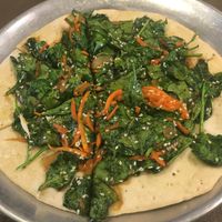 Vegan Sesame Ginger Pizza - crust can also be ordered gluten free but this is the crust containing gluten at Revelations in Fairfield