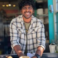 Owner Praveen serving their delicious Cacao + espresso at Fika in Victoria
