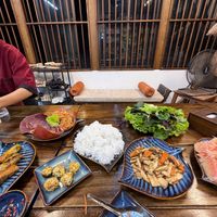Spring rolls, banana leaf salad, stuffed mushrooms, vermicelli rice noodles, greens, stir fry veggies and pomelo  at Rose Kitchen in Hà Nội