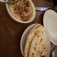Vegan hummus and pita bread  at Meraki Greek Restaurant & Bar in London