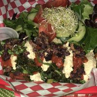 Lasagna and a side salad  at Rawtopian Bliss Cafe in Columbia