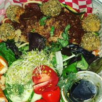 Spaghetti and a side salad  at Rawtopian Bliss Cafe in Columbia
