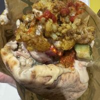 Cauliflower pita with harissa and tahini —yumm  at Falafel Plant in New York City