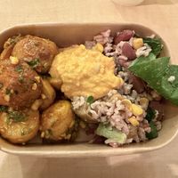 From the salad section, potatoes, salad and hummus.  at Revive Cafe - Wyndham St in Auckland