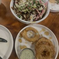 Burnt end nachos and tempura squash donuts (minus a few bites 🤭)  at Dreamstate Cafe in Minneapolis