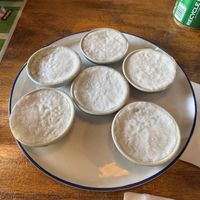 Thai custard (made from Coconut). Top layer is soft & pillowy. Bottom layer is heavier & sweet. Very yummy.  at SENYAI Thai Street Food & Noodle Bar in Jacksonville