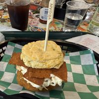 Vegan jalapeño cheddar biscuit with chicken patty, bacon and coleslaw  at Bubba's Biscuit Bar in Hudson