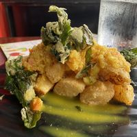Fried cassava with quinoa salsa  at Chifa La Familia Feliz in La Fortuna