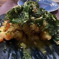 Yucca with kale and quinoa  at Chifa La Familia Feliz in La Fortuna