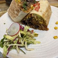 Amazing tofu burrito with vegan cheese!  at Village Cantina Werribee in Werribee