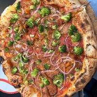 Pizza vegana with onion, aubergine and brocolli at Mozzart Pizza Center in Athina