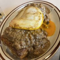 Biscuits and gravy with sunny side egg  at Street Beet in Detroit