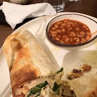 English breakfast with scrambled tofu vegan sausage sun dried tomatoes mayo and homemade beans   at San Domenico Caffe in Kosice