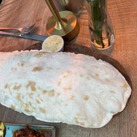 Beautiful freshly baked flatbread   at Olive & Thyme in Manchester