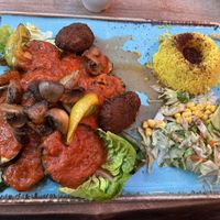 Grilled vegetables with tomato sauce, with falafel, mushrooms, green beans & spiced  rice,   at Olive & Thyme in Manchester