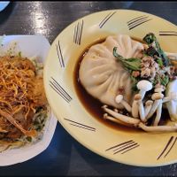Crab cakes and giant dumpling plate at Avo in Nashville