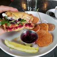 Burger with beet ketchup and sweet potato fries at Avo in Nashville
