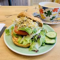 Hummus salad on the tomato bagel at Bagels & Beans - Haarlemmerdijk in Amsterdam
