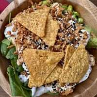 Bowl with quinoa base, tofu, edamame beans, and a range of vegetables and toppings.   at Hawaiian Poké Bowl - Korenmarkt in Vlaanderen