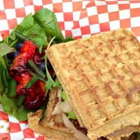 Veggie burger on waffle bun, topped with spicy mayo, with a salad on the side using local produce. Meal is completely vegan (she uses a vegan waffle recipe, and vegan mayo!) at Emergency Munchie Truck in West Lafayette