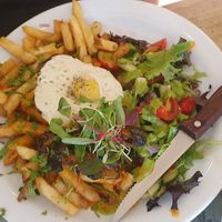 lion meat steak with egg at Plantuguese in Bristol