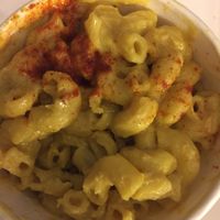 Mac and cheese.  bite missing I couldn't resist  at Three Carrots - City Market in Indianapolis