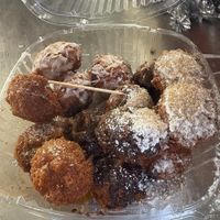 Variety pack of gluten-free donuts at Kitoko Bites - Apex in Apex