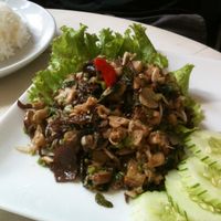 Called 'Laab Mak Keua' for 35000 kip. Grilled eggplant, mushrooms, herbs (lemon grass, garlic, galingale and a little bit of pepper), long bean and Vegetables. Served with rice.  at Indigo Cafe in Luang Prabang