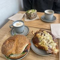 BLT bagel, almond croissant (front) and green dwich (back)  at Land & Monkeys - Beaubourg in Paris