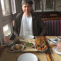 Dad and vegan plate with small dishes! at Stupa View in Kathmandu