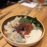 Spinach ravioli with vegan yogurt saucee  at Vegan Community Kitchen in Istanbul