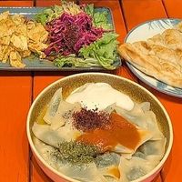 Delicious homemade food. I recommend the spinach manti and the tofu salad. at Vegan Community Kitchen in Istanbul