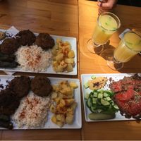 “Doner saytan kebab” with rice and potatoes, “Meatballs”, side of delicious hummus, cucumber mint salad, handmade domas. Top notch, homemade! at Vegan Community Kitchen in Istanbul