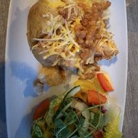 Jacket potato with beans & vegan cheese  at Harley's Bistro & Café Bar in Ambleside