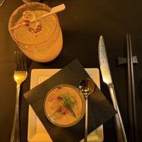 Carrot turmeric ginger coconut milk soup with tropic alkemē mocktaill  at Alkemē in Santa Fe