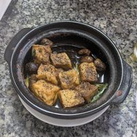 Tofu and mushrooms with bean sauce at Tilly Vegan in Ho Chi Minh City