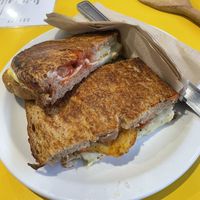 Vegan All Day Breakfast Sourdough Toastie (with vegan sausage, vegan cheese, & hashbrown)  at The Flying Saucer in Brighton