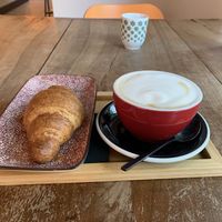Vegan orange croissant and cappuccino with soy milk  at NaBi by Bgood in Milan
