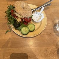 (Veggie) Sesame bagel with grilled veg/parmigiano/pesto/pinenuts with chive cream “cheese"  at Bagels & Beans - Keizersgracht in Amsterdam