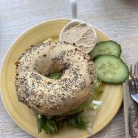 avocado, salad, tomato pesto cream cheese on everything bagel  at Bagels & Beans - Roetersstraat in Amsterdam