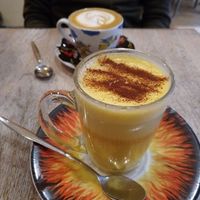 golden milk tea with almond milk  at Bagels & Beans - Van Baerlestraat in Amsterdam