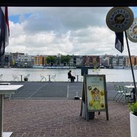Terras aan het water  at Bagels & Beans - Veemkade in Amsterdam
