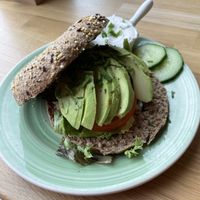 Avocado wholemeal bagel with chives vegan cream cheese 🥯   at Bagels & Beans - Veemkade in Amsterdam
