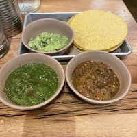 Guacamole, salsa verde, and salsa roja  at Bartaco in Charleston