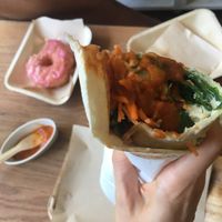 Veggie wrap loaded with hot sauce!  at Vegabond - Leliegracht in Amsterdam